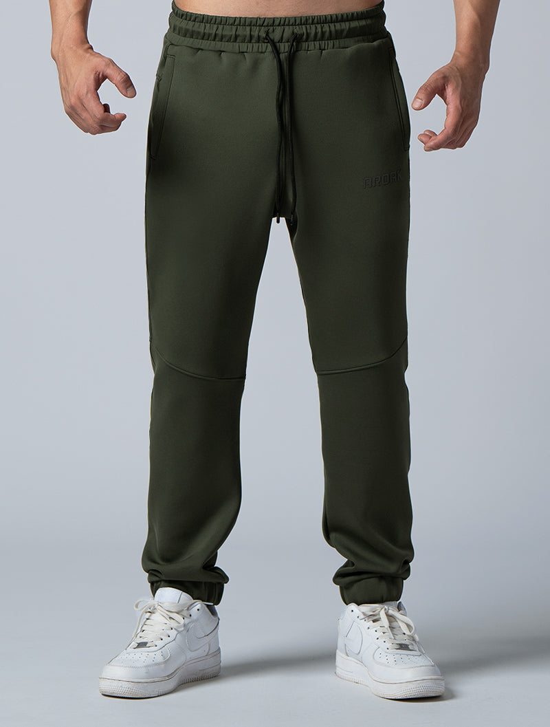 AirFlex™ loose-fitting cuffed trousers (dark green)